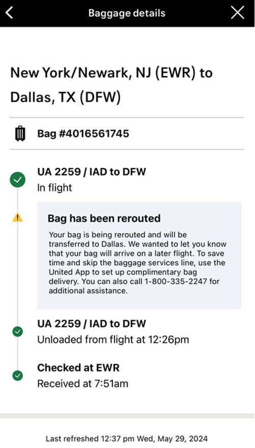 A screenshot of United's app showing the rerouted bag messaging on the author's EWR-DFW flight.