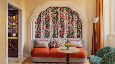 Flowers and bright colors adorn a guestroom at the new Casa Monti hotel in Rome.