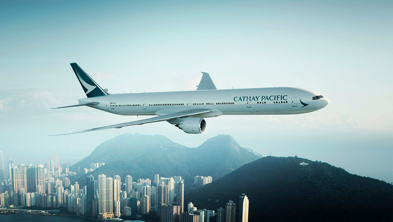 A Cathay Pacific Boeing 777-300ER plane over Hong Kong.