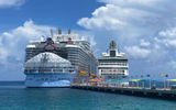 Cruise editor Andrea Zelinski previewed the line's sixth Oasis-class ship prior to its official debut and shares images from the sailing. Pictured, the Utopia of the Seas dwarfs the Vision of the Seas at Perfect Day at CocoCay.