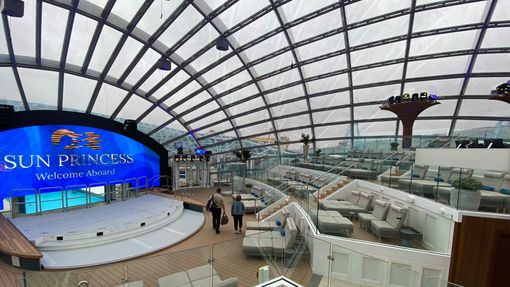 The Dome is filled with plush chaise lounge chairs in an amphitheater-like arrangement.