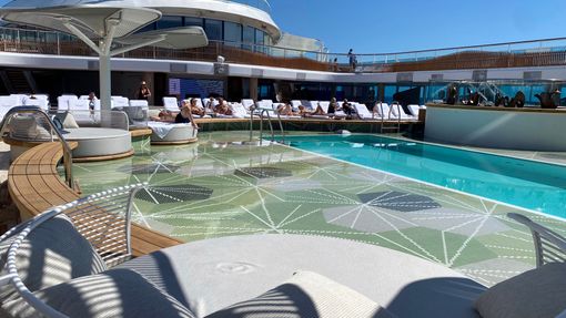 The pool deck on Oceania's Vista has a large tanning ledge where guests can walk, sit or sunbathe.