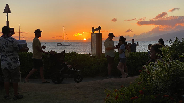 During a trip to Maui, Hawaii in mid-July, news editor Johanna Jainchill visited Kaanapali Beach, staying at the Kaanapali Alii resort in West Maui, and in Wailea at the Grand Wailea Waldorf Resort in South Maui. The view from the Hula Grill Kaaanapali Beach, as a steady stream of passersby strolled along Kaaanapali Beach taking in its famed sunset.