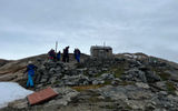 Hiking among ruins on Norder Aputiteg in Greenland.