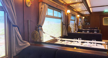 The two railcars in the Royal Railway -- Utopia Station experience together seat 48 guests. Tables are limited to four people.