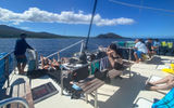 Relaxing on Kai Kanani's catamaran after the sunrise snorkeling tour to Molokini and Turtle Town.