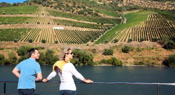 AmaWaterways guests view the Portuguese countryside from the deck of the AmaVida.