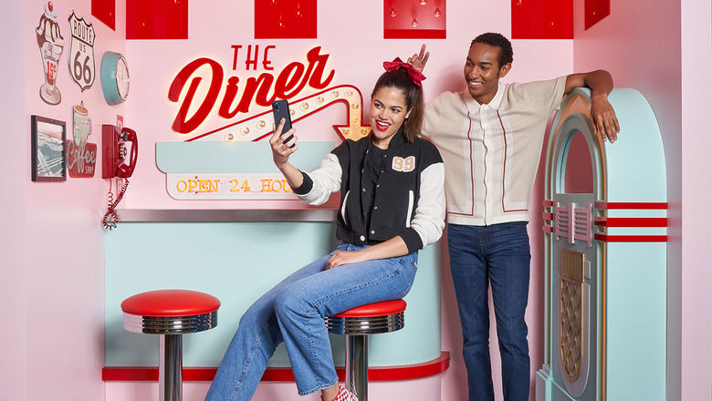 Options in The Selfie Studio: Decades Tour include a 1950s diner setting featuring chessboard flooring, retro wall art, a lunch counter and a jukebox.