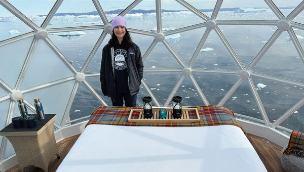 The writer's daughter inside one of the igloos after it was set up for an overnight stay.