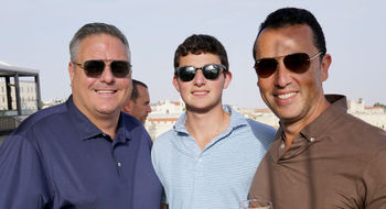 From left, Signature Travel Network CEO Alex Sharpe, Daniel Leibman and Frosch CEO Bryan Leibman in Israel.